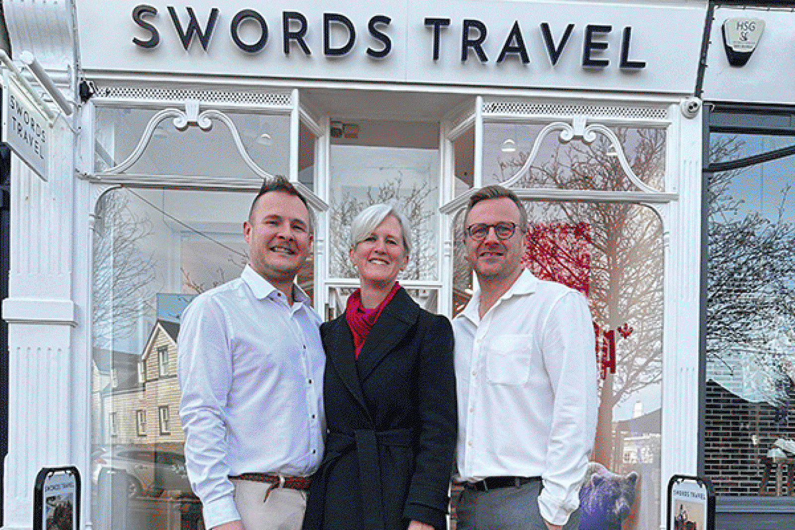 Sonia Davies of Scott Dunn with Stuart and Mark Swords at their Wimbledon store 
