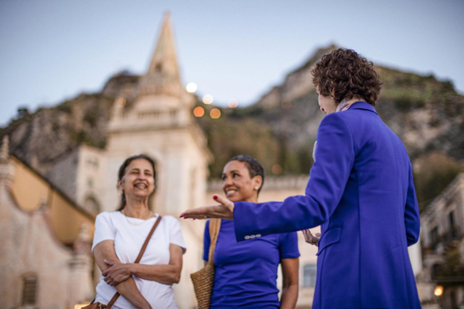 Local expert with guests at sunrise in Taormina_Insight Vacations_March 2024.jpg