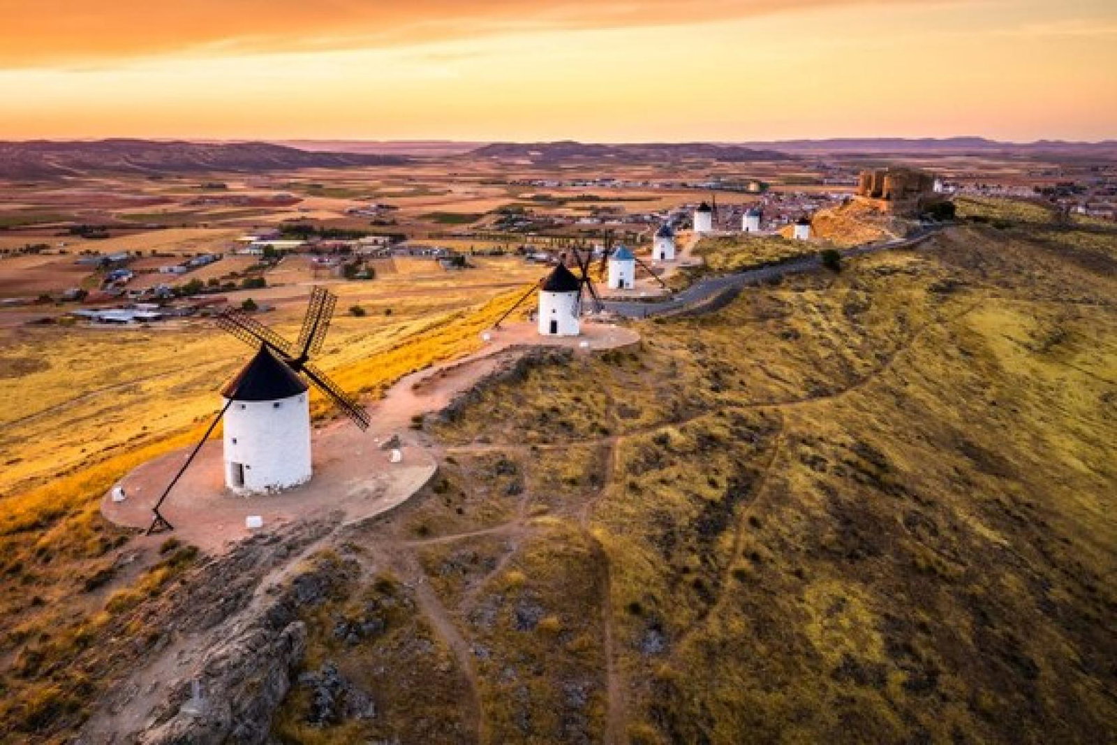Spain Consuegra at sunset. Castilla La Mancha, Spain windmils iStock-1289275469 (Credit: iStock)
