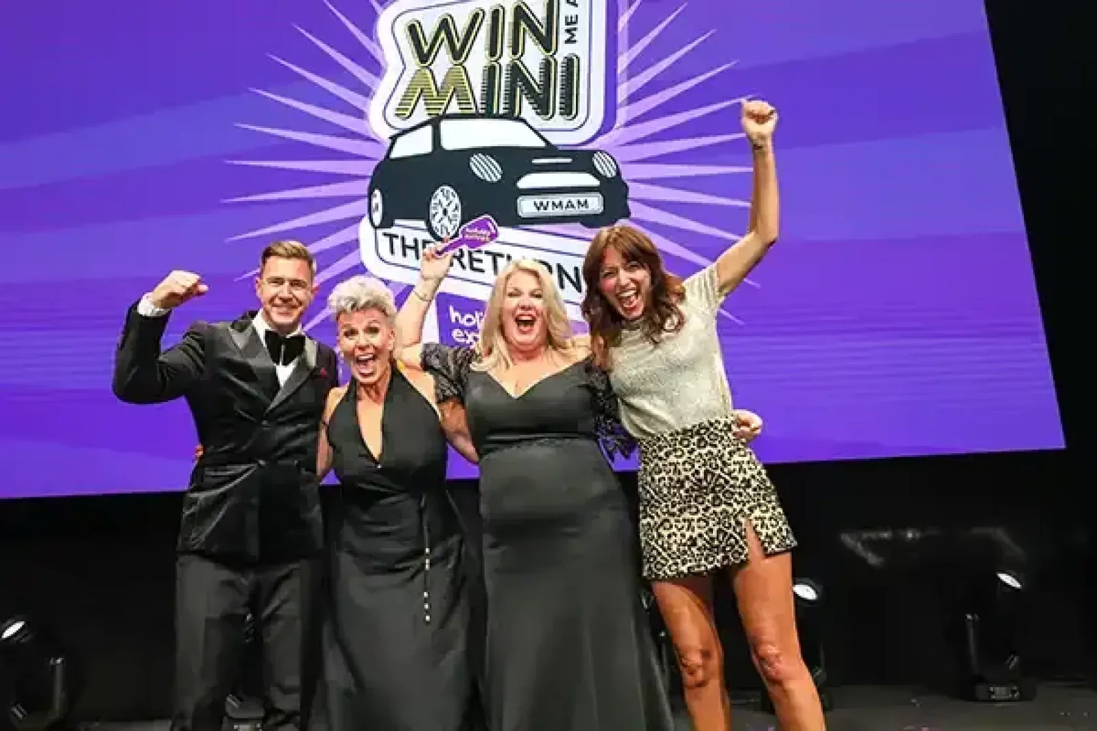 L-R: TTG's managing director Matt Roclawski, Holiday Extras’ national retail manager for the UK and Europe Lindsay Garvey-Jones, winner Debbie Poole from Lincolnshire Co-op Travel and event host Davina McCall