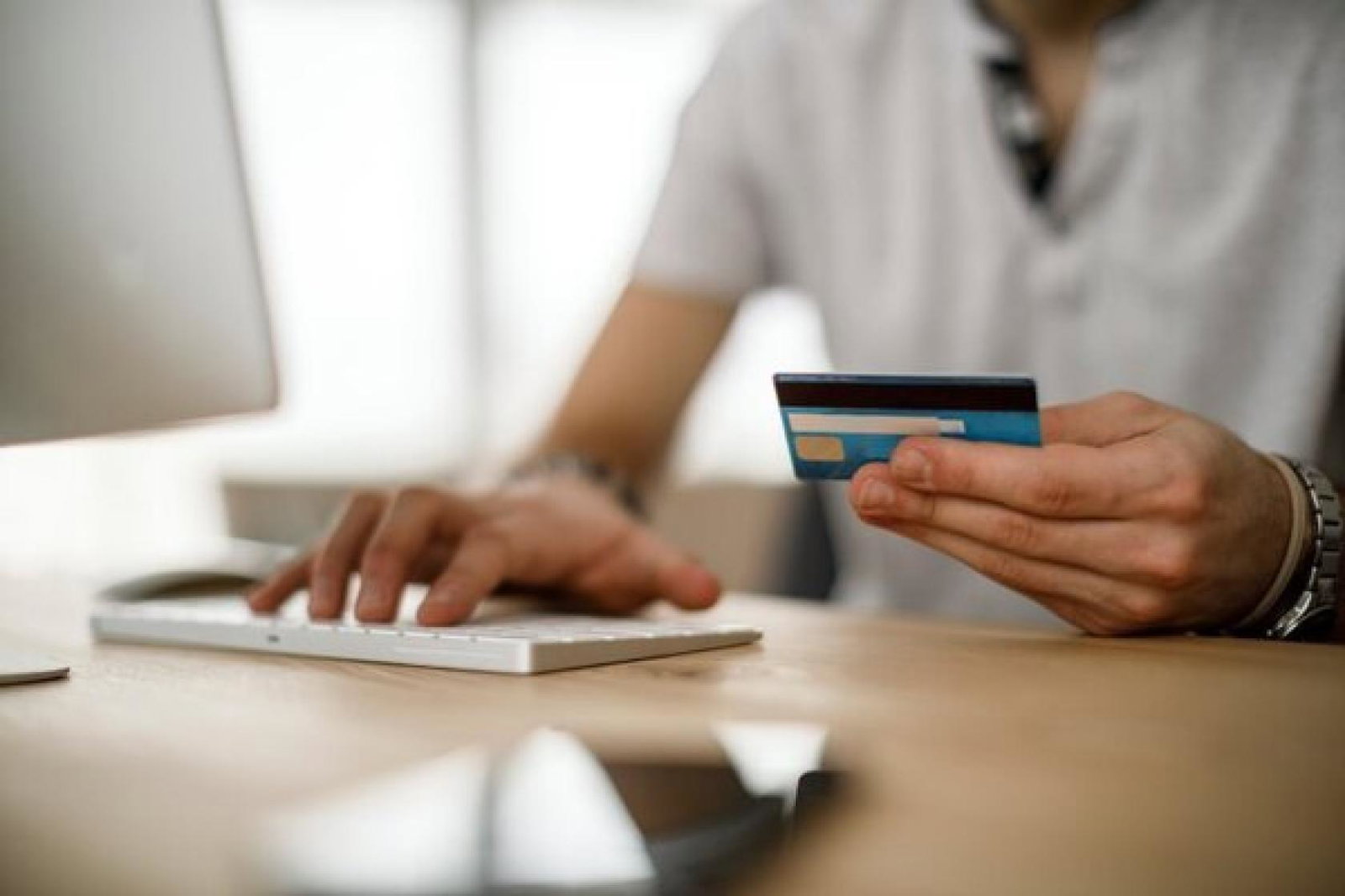 card_payment_keyboard_money_scam_fraud_iStock-1175077095 (Credit: iStock / damircudic)