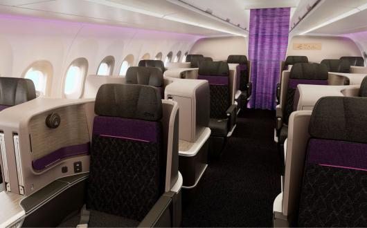Wide business class seats on flight