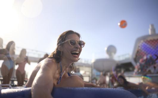 Smiling woman holding inflatable 