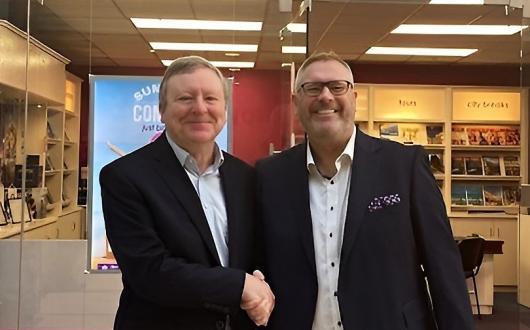 Just Split's Jim Vaughan pictured with Best4Travel's Jeff Collins