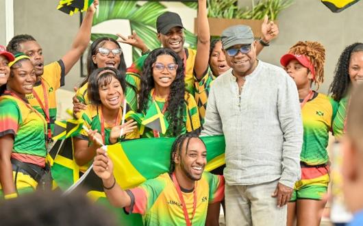 Edmund Bartlett, Jamaica's Minister of Tourism, celebrating with RIU employees