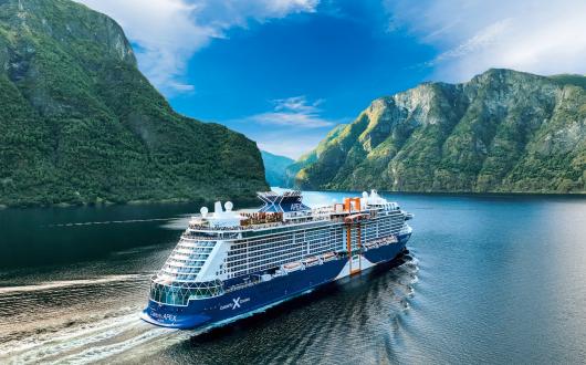 Celebrity Apex ship sailing through the fjords 