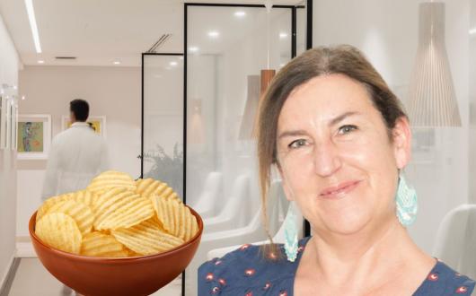 A bowl of crisps and a smiling a brunette woman in front of a medical clinic 