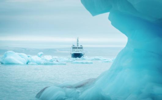 The ship Polar Athena sits in sea ice - credit Lars Korvald for Secret Atlas