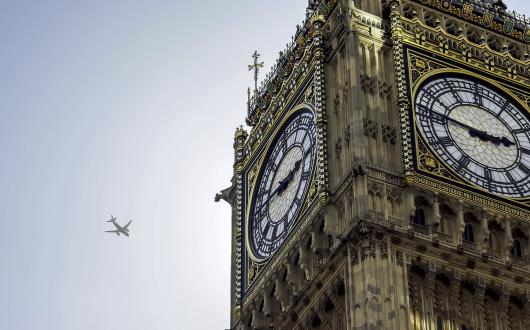 Big Ben with aircraft (stock)