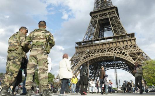 French army soldiers patrol the Eiffel Tower in Paris, terrorism
