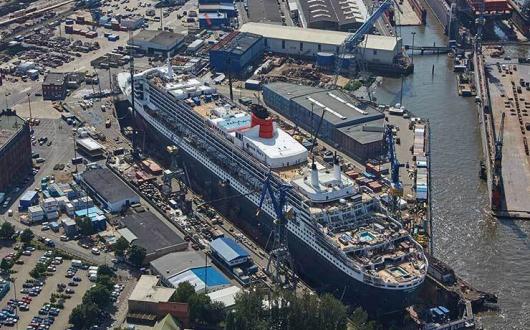 Aerial view of QM2 in dry dock
