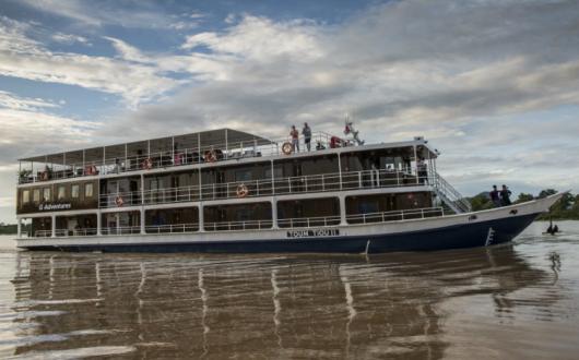 G Adventures ship in the Mekong