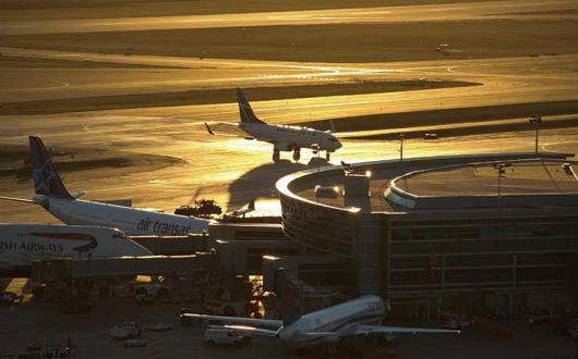 Jets at terminal at sunset