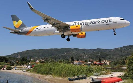Thomas Cook jet coming in to land over beach