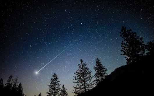 Shooting star in the night sky