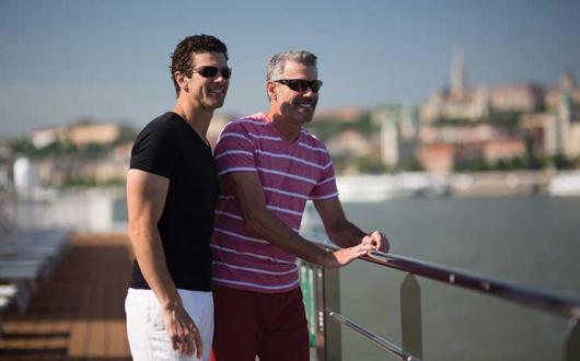 Gay couple on balcony