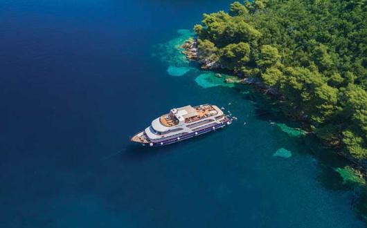 Yacht in crystal blue waters