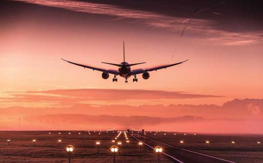 Jet airliner at sunset
