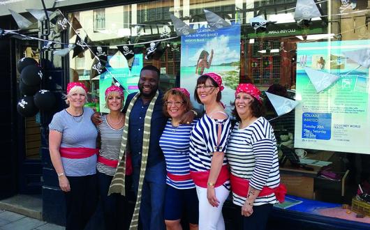 The team dressed up as pirates for their Caribbean Day.jpg