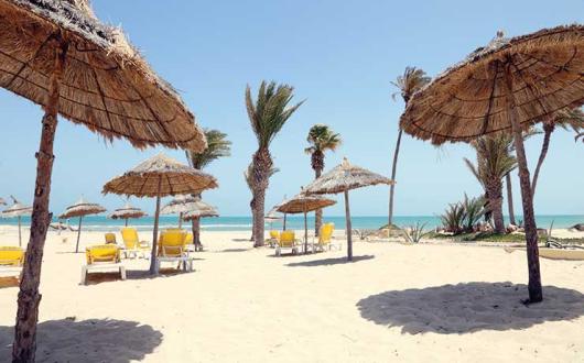 Tunisian beach, sun loungers and parasols