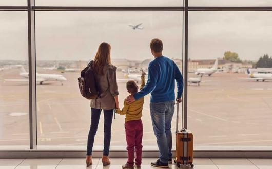 Family at airport departures