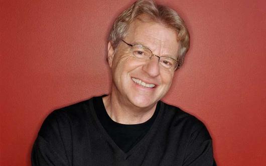 Jerry Springer in a black sweater