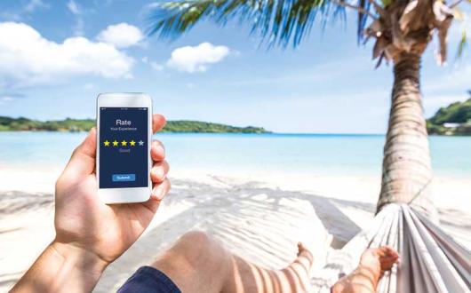 Using a smartphone on the beach