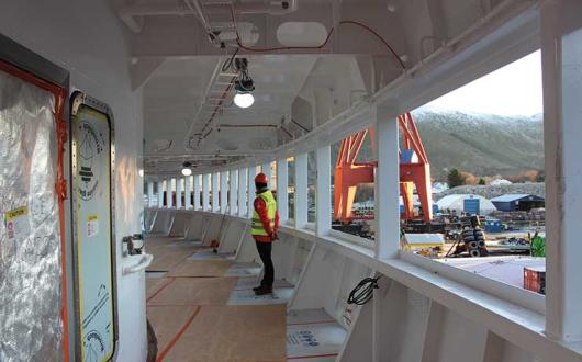 Panoramic windows leading to the wrap around observation deck