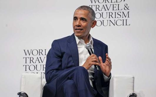 Obama talking at World Travel & Tourism Council