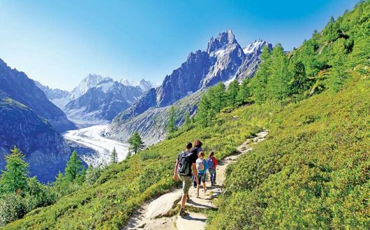 Family trekking in the Alps at Chamonix