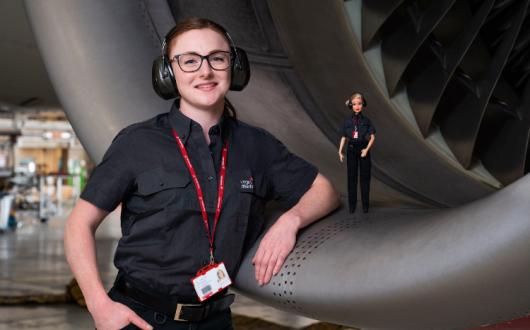 A Virgin Atlantic engineer and Barbie wear the same uniform