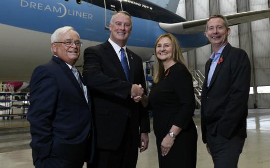 Andrew Flintham and Dawn Wilson from Tui, and Greg Donovan and Jack L. Ryals from the airport
