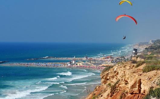 Paragliding over the beach. Netanya, Israel. Image: Eduard Stern