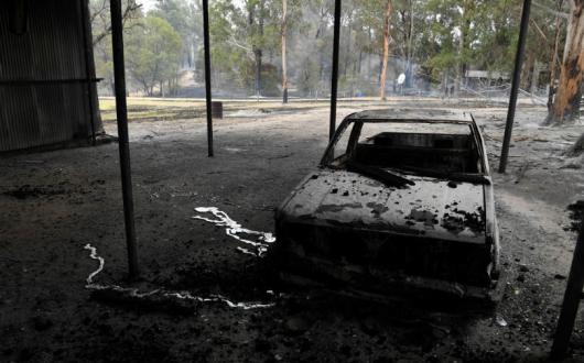 A burnt-out car after bushfires in Victoria, Australia. Picture: AAP Image/James Ross