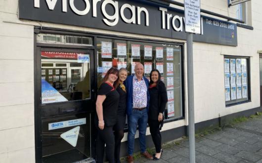 Simon Morgan (centre right) with the Morgan Travel team