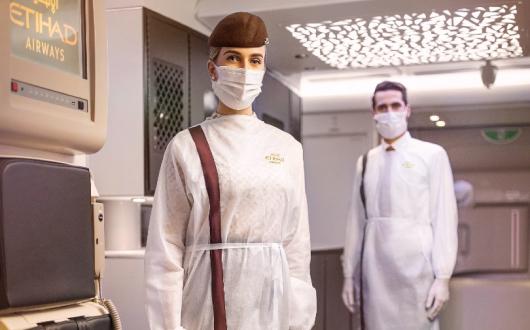 Etihad_Cabin_Crew_in_PPE.jpg