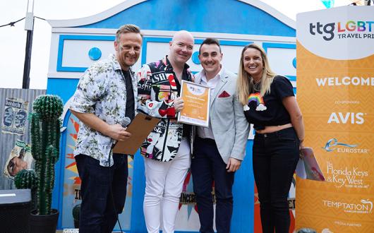 Richard Tolley collects his Travel Pride Champion certificate in 2019