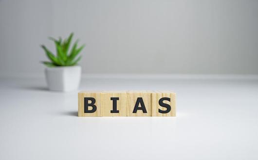 What is unconscious bias and how can we limit its impact in the workplace?