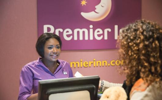 Premier Inn parent Whitbread has announced plans to reduce its workforce by nearly 20%