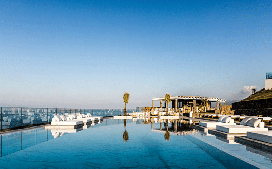 The pool area at Abaton sits between two stylish restaurants