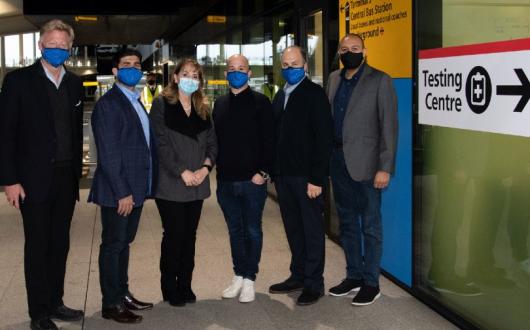 A group of volunteers used the CommonPass digital health pass before boarding their flight