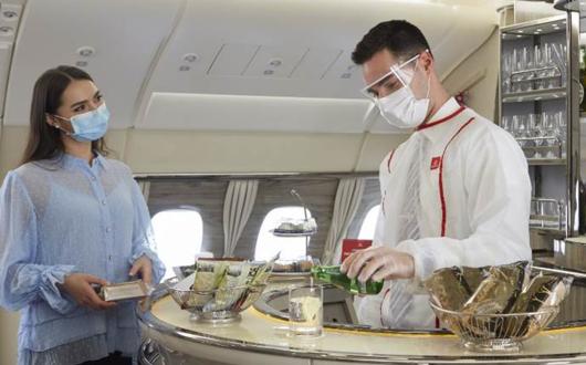 Emirates' premium passengers' bar has re-opened for takeaway drinks