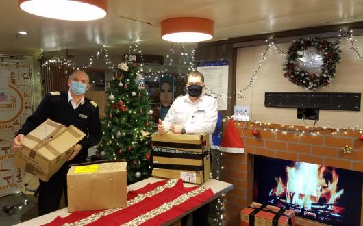 Holland_America_Line_captain_Christmas_donations.jpg