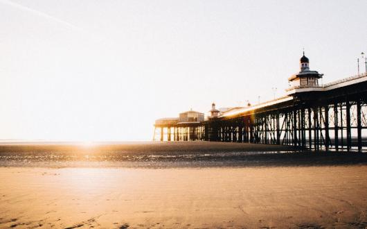 Freeth said June was proving popular for forward bookings (Pictured: Blackpool beach. Credit Luke Ellis Craven / Unsplash)