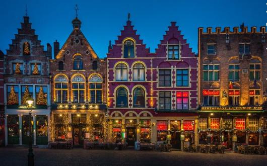 Trips include a four-day Bruges break (Olivier Depaep / Unsplash)
