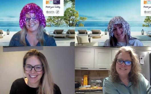 The Personal Travel Agents' Sheena Whittle and Anna Langford in their Wigs Of Wonder with TTG's Abigail Healy and Gold Medal's Clare Weatherall