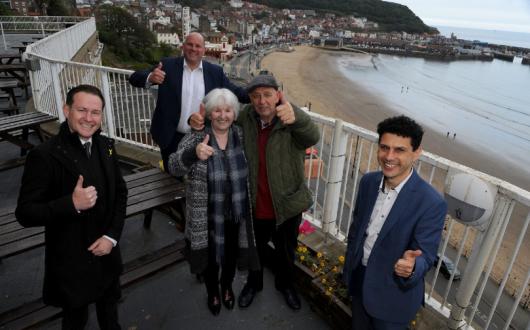 Andy Freeth (back, centre) said it was 'wonderful' to share in passengers' excitement