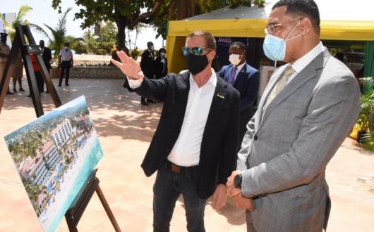 Stewart (left) said the new Dunn's River resort was the last one on which he collaborated with his late father