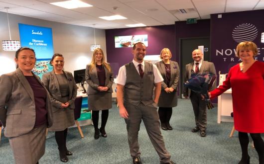 Paul Johnstone (centre) opened the Newcastle store in December 2020