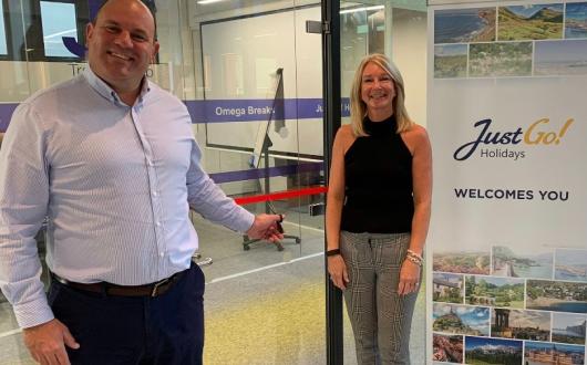 Chief executive Andy Freeth (left) and HR director Helen Moylan (right) officially open the second floor of the new office space